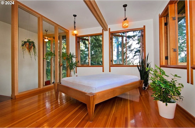 2275 Floral Hill Dr, Eugene, OR 97403 - interior space with hardwood / wood-style flooring and beamed ceiling