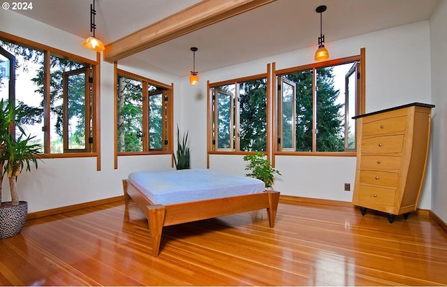 2275 Floral Hill Dr, Eugene, OR 97403 - bedroom featuring hardwood / wood-style floors and multiple windows