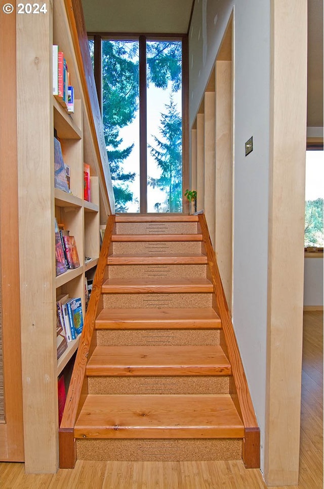 2275 Floral Hill Dr, Eugene, OR 97403 - stairway featuring hardwood / wood-style flooring