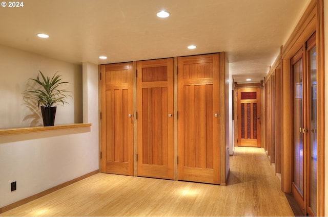 2275 Floral Hill Dr, Eugene, OR 97403 - hallway featuring light hardwood / wood-style floors