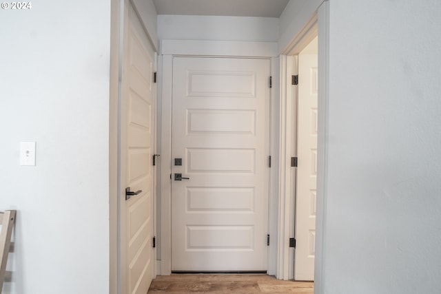 doorway with light hardwood / wood-style flooring