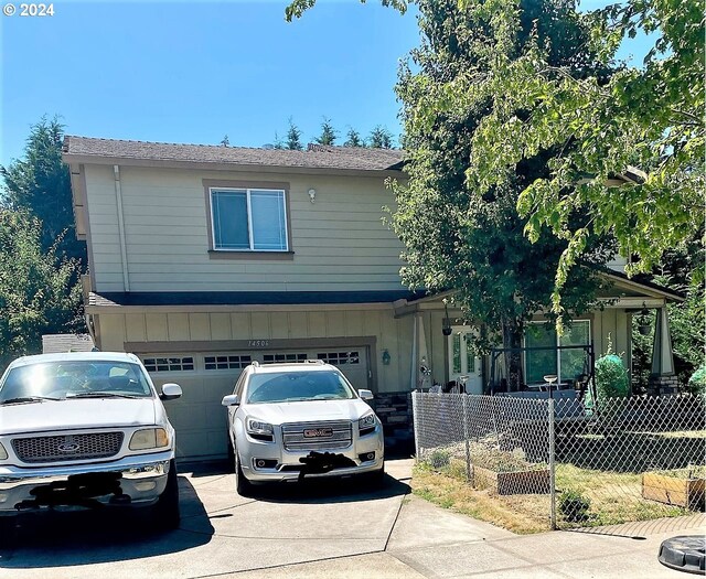 view of front of home with a garage