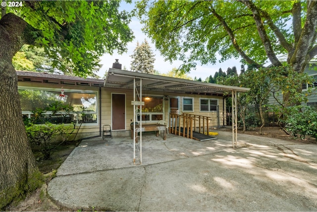 view of front of home featuring a patio