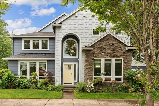 5898 SE Thornapple St, Hillsboro, OR 97123 - view of front facade with stone siding and a front yard