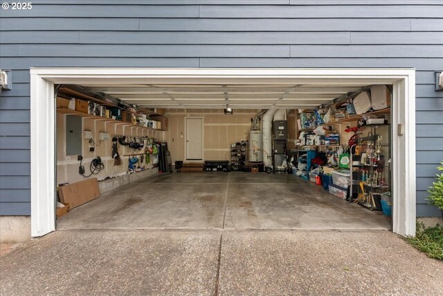 5898 SE Thornapple St, Hillsboro, OR 97123 - garage featuring water heater and electric panel