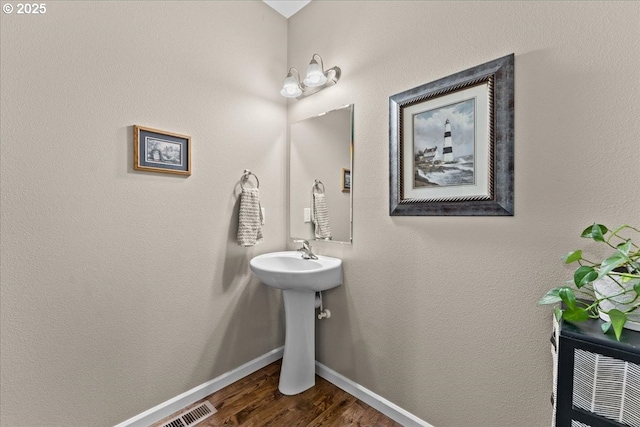 5898 SE Thornapple St, Hillsboro, OR 97123 - bathroom with wood finished floors and baseboards