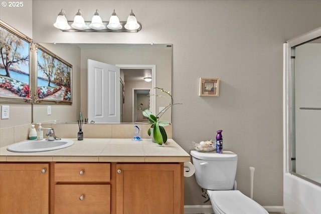 5898 SE Thornapple St, Hillsboro, OR 97123 - bathroom with vanity, toilet, and shower / bath combination with glass door
