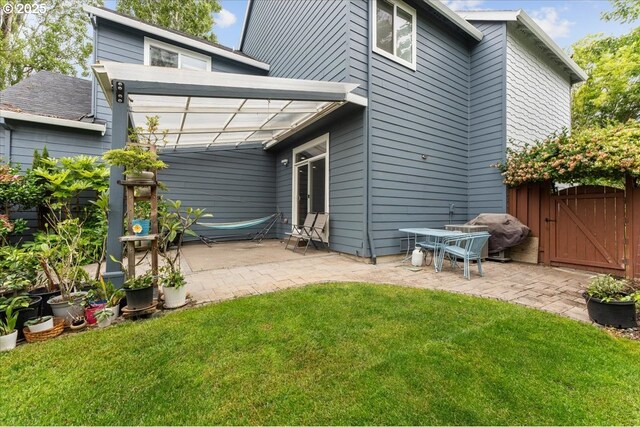 5898 SE Thornapple St, Hillsboro, OR 97123 - back of property featuring a patio and a gate