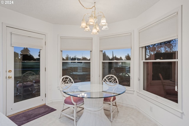 dining room featuring a notable chandelier