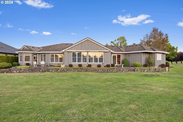 view of front of house with a front lawn