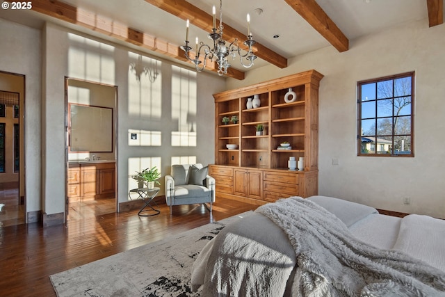 bedroom with dark wood-type flooring, beamed ceiling, and a chandelier