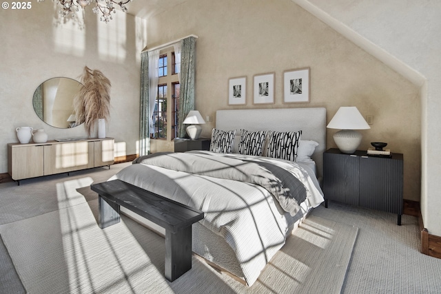 bedroom featuring high vaulted ceiling and carpet