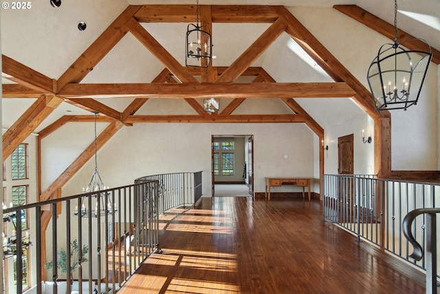 hallway with an inviting chandelier, beam ceiling, high vaulted ceiling, and hardwood / wood-style flooring