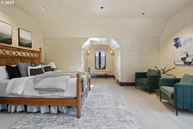 bedroom featuring vaulted ceiling and light colored carpet