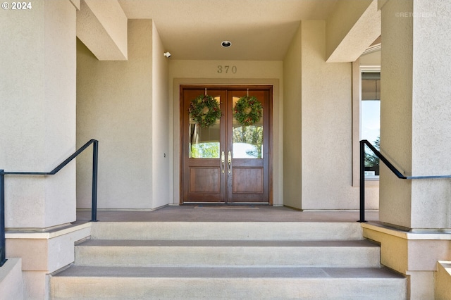 doorway to property featuring french doors