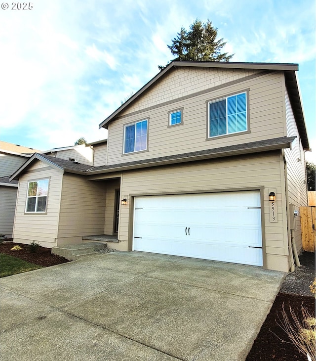 view of front of property featuring a garage