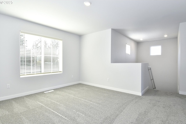 empty room featuring carpet floors