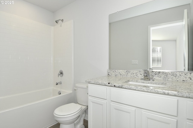 full bathroom with tub / shower combination, toilet, and vanity