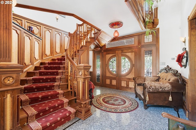 entryway with french doors and vaulted ceiling