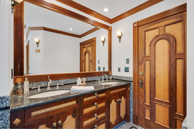 bathroom featuring vanity and ornamental molding