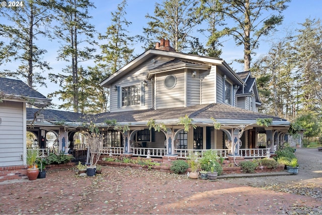 view of front of home featuring covered porch