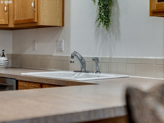 4196 SE Pinehurst Ave, Milwaukie, OR 97267 - kitchen with a sink, light countertops, and brown cabinets