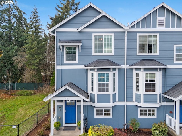 view of front of property with a front lawn