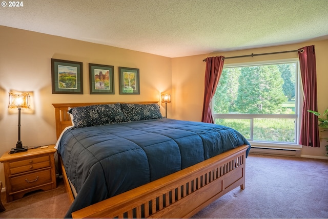 carpeted bedroom with a textured ceiling