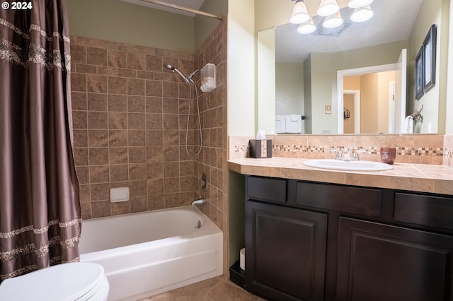 full bathroom featuring toilet, tile patterned flooring, shower / tub combo with curtain, decorative backsplash, and vanity