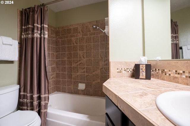 full bathroom with toilet, shower / tub combo, vanity, and decorative backsplash