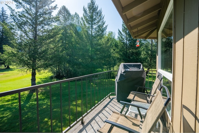 balcony featuring area for grilling