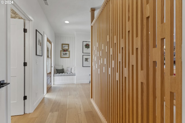 corridor with light wood-type flooring