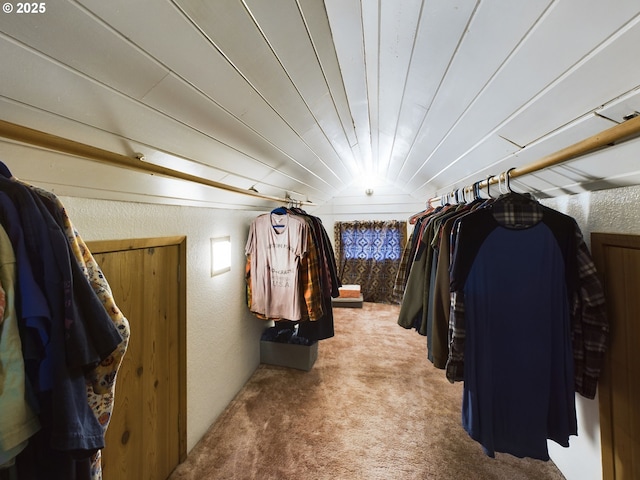 spacious closet with carpet flooring