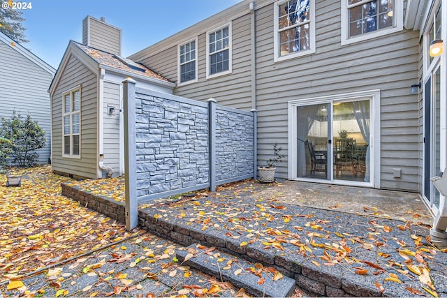 rear view of property with a patio area