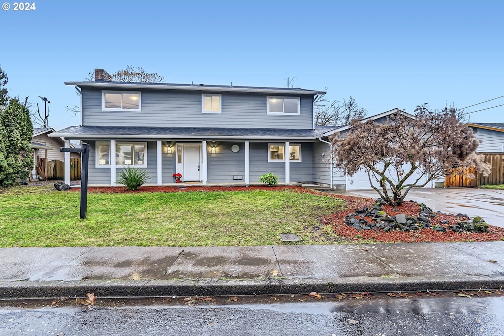 830 NE 18th St, Mcminnville, OR 97128 - view of property with covered porch and a front yard
