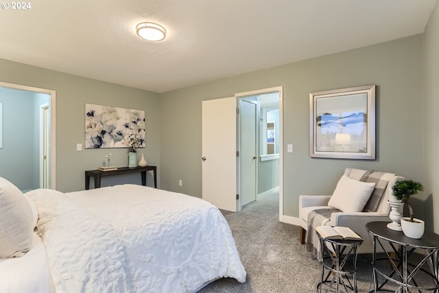 bedroom featuring light colored carpet