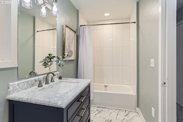 bathroom featuring vanity and shower / bath combination with curtain