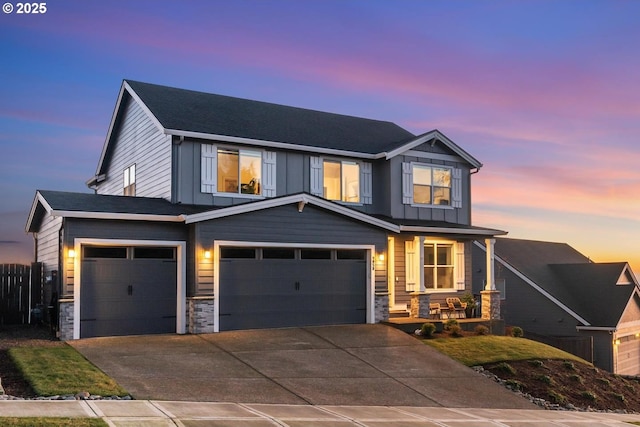 craftsman-style home featuring a porch and a garage