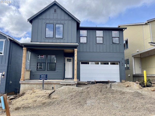 modern farmhouse style home with board and batten siding, a porch, and a garage