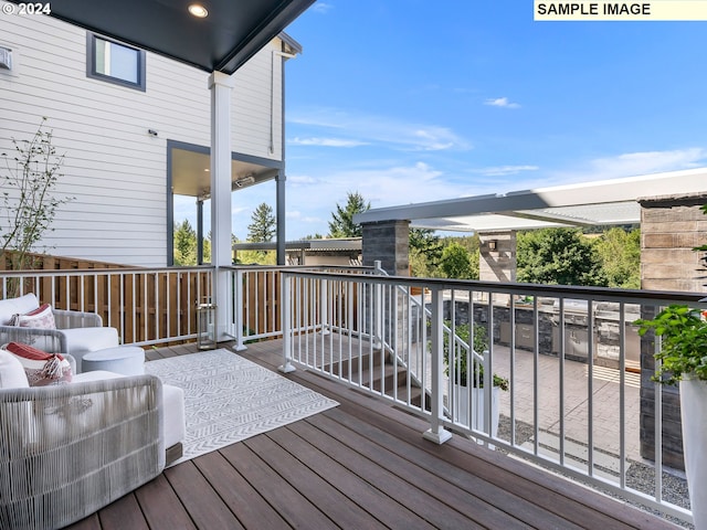 deck featuring an outdoor living space