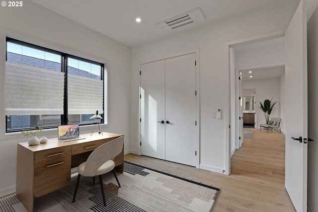 office area featuring recessed lighting, light wood-style flooring, visible vents, and baseboards