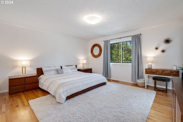 bedroom featuring light hardwood / wood-style flooring