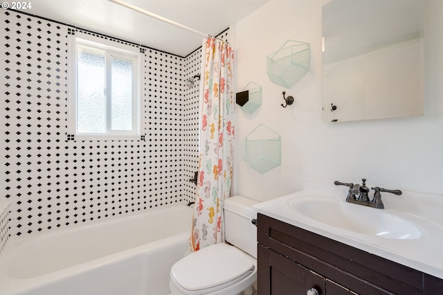 full bathroom with toilet, vanity, and shower / tub combo with curtain