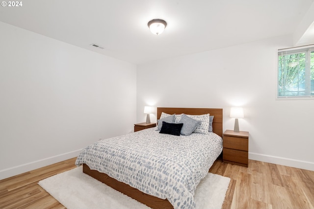 bedroom featuring light hardwood / wood-style floors