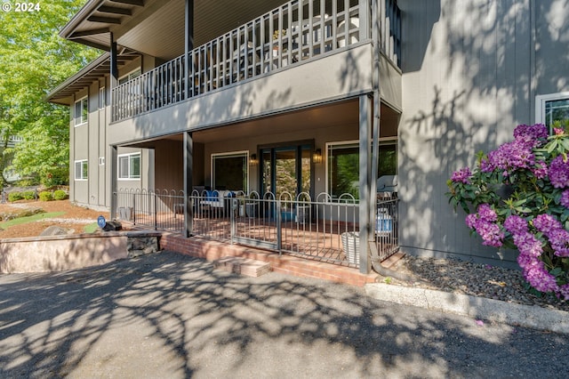 property entrance with a balcony