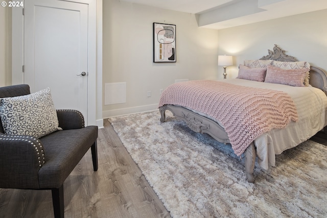 2868 NW Cumberland Rd, Portland, OR 97210 - bedroom featuring wood finished floors and baseboards