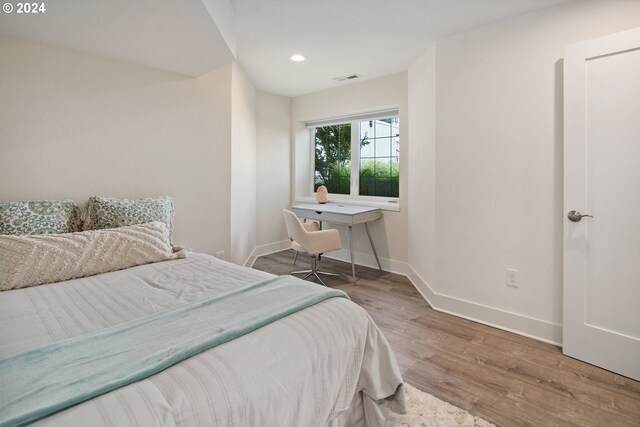 2868 NW Cumberland Rd, Portland, OR 97210 - bedroom featuring wood finished floors and recessed lighting