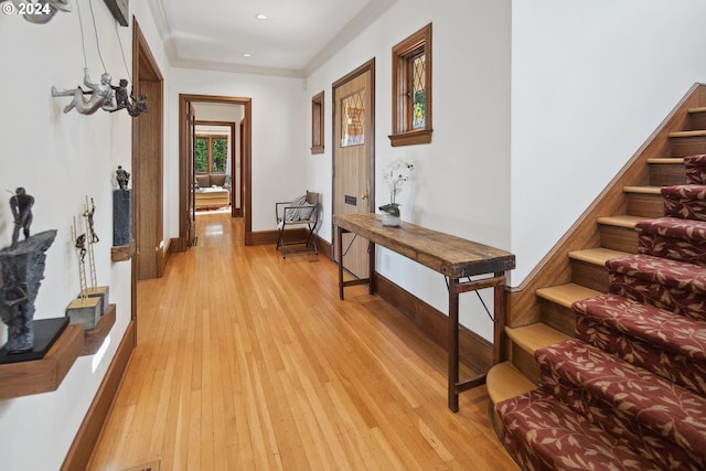 2868 NW Cumberland Rd, Portland, OR 97210 - hall with light wood-style flooring, recessed lighting, stairs, and crown molding