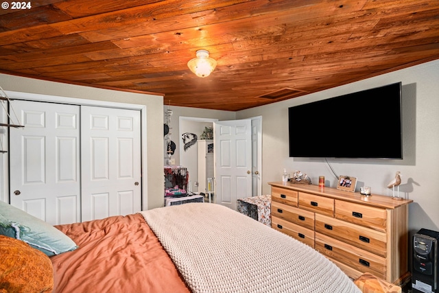 bedroom featuring wooden ceiling and a closet