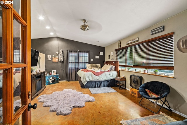 bedroom featuring ceiling fan and lofted ceiling